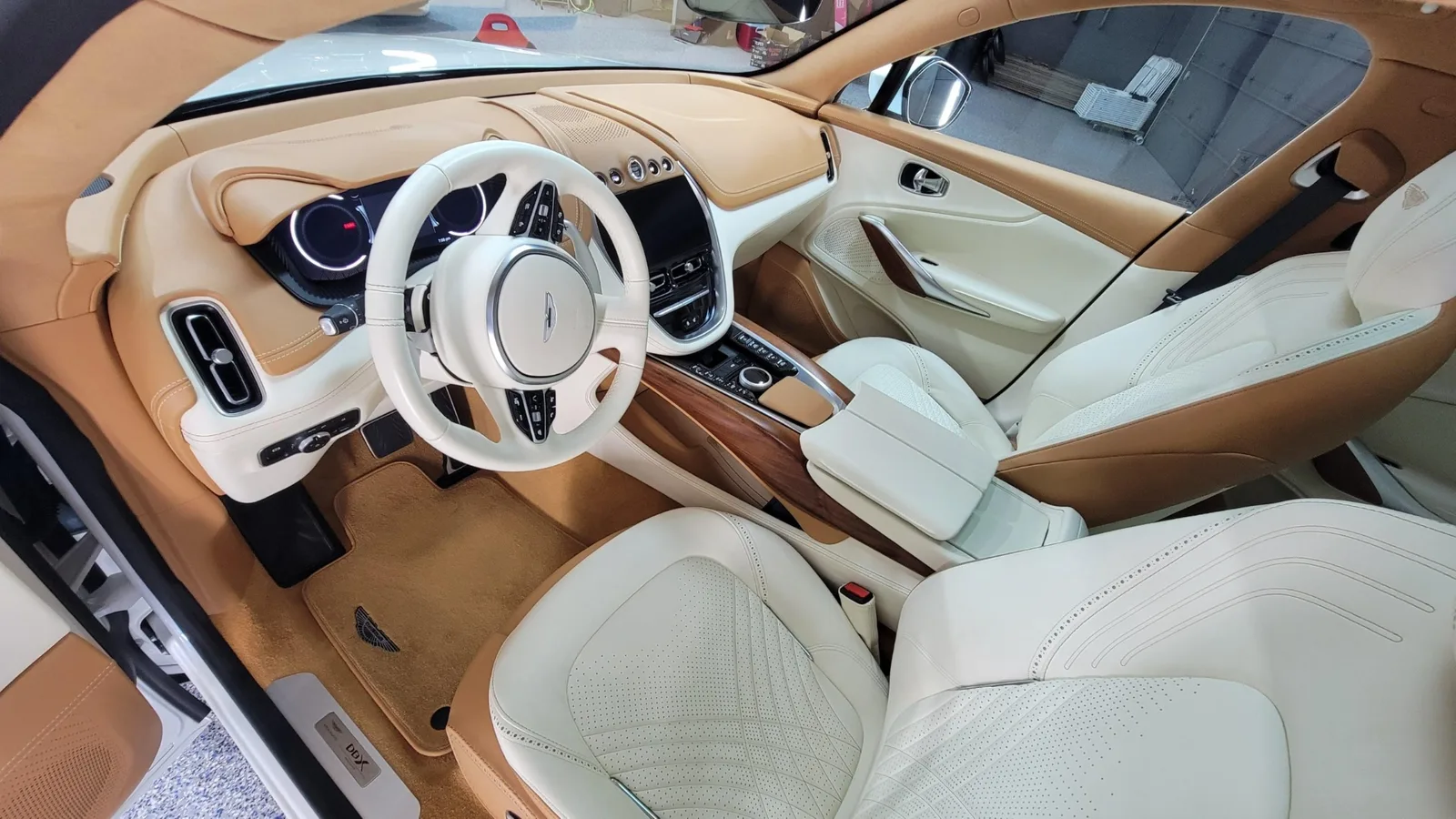 Aston Martin DBX cream and tan leather interior, fully detailed, OEM steering wheel and dashboard