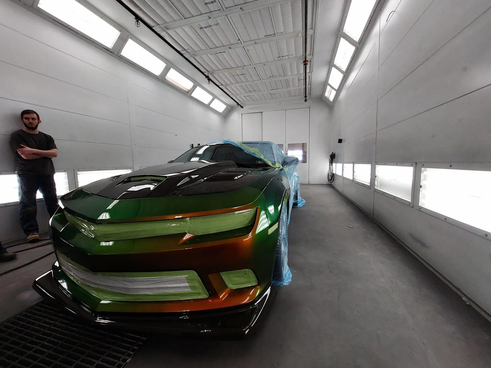 Chevrolet Camaro SS with factory chameleon green-to-orange paint, fresh from the booth after full-body clear PeelClear application