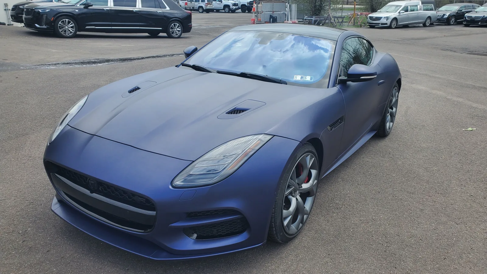 Matte navy Jaguar F-Type, front three-quarter driver side, after full-body PeelClear with color change