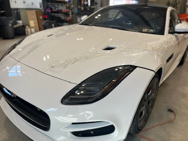 White Jaguar F-Type before PeelClear, front three-quarter driver side